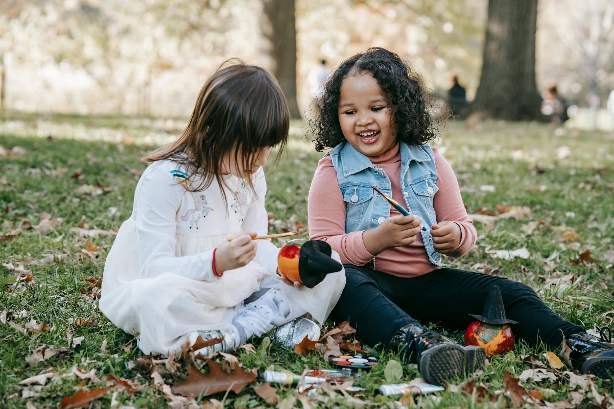 two girls doing Halloween activities